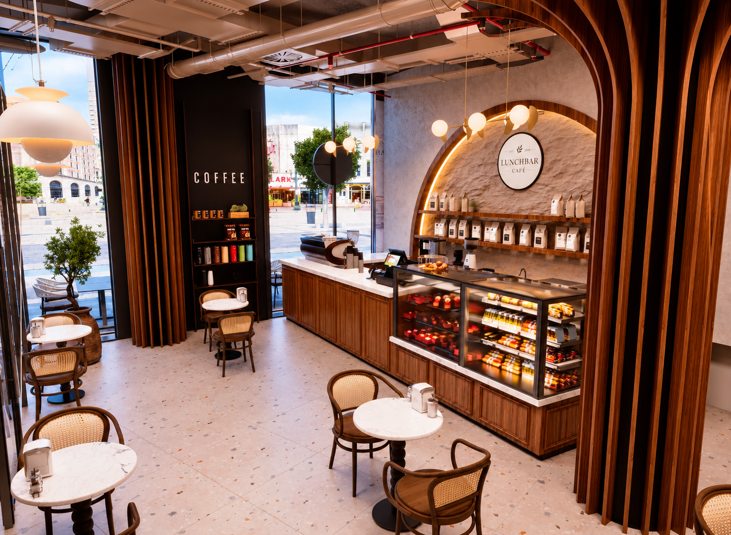 Koffiehoek en vitrine met lekkernijen bij Lunchbar Café Sloterdijk